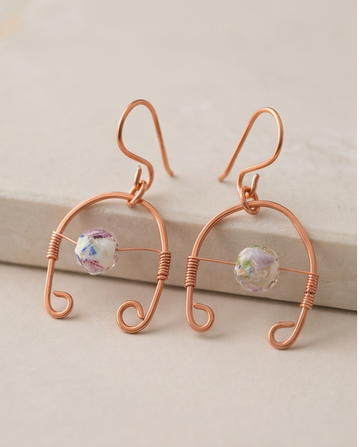 Pair of Confetti Bloom copper-tone wire dangle earrings