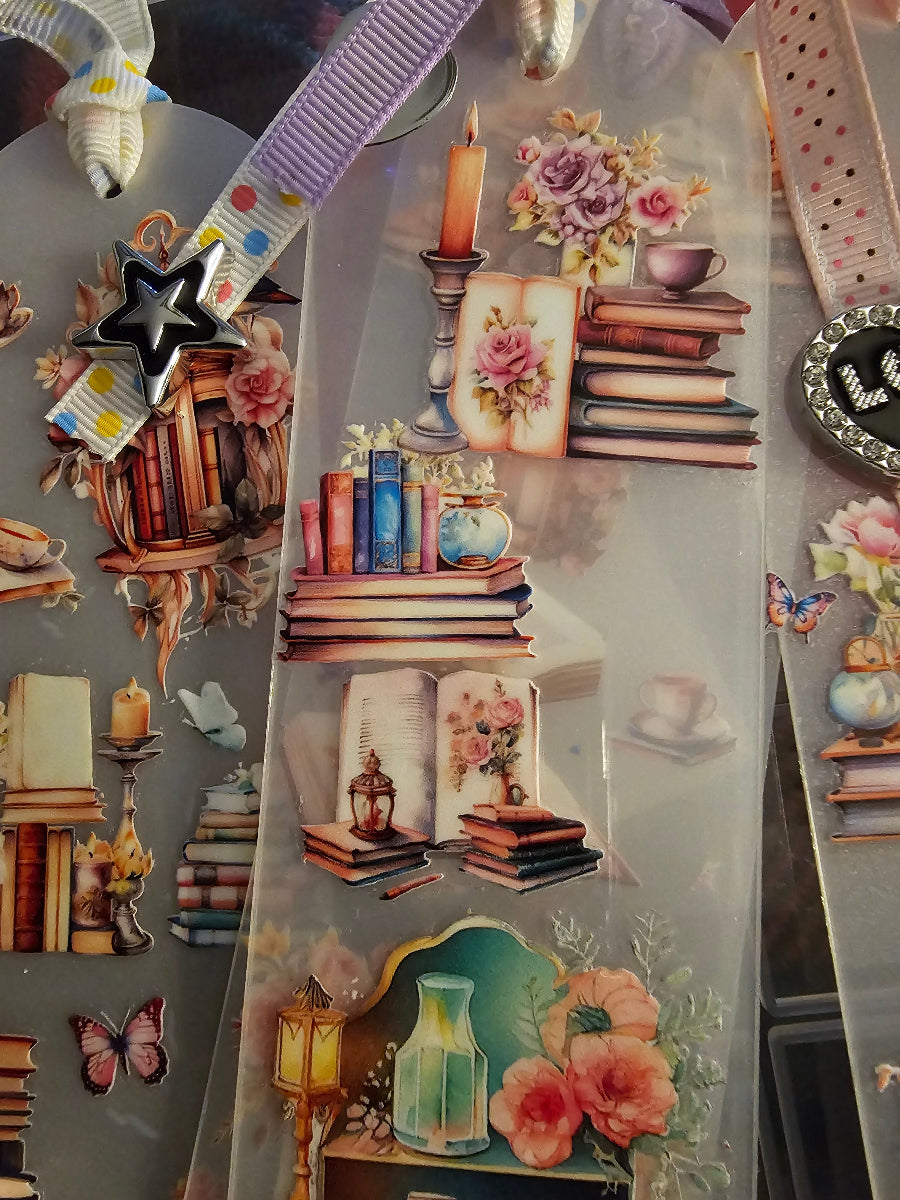 Decorative Handmade Unique Book Charm Bookmark border with books, flowers, and candles on a gray background